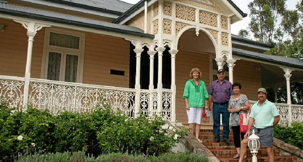 Linda Weymouth, Henry and Rosemary Baillie and Bill Weymouth from the Millmerran Historical Society stand on the steps of Deconlay overlooking the gardens. Linda Weymouth, Henry and Rosemary Baillie and Bill Weymouth from the Millmerran Historical Society stand on the steps of Deconlay overlooking the gardens.